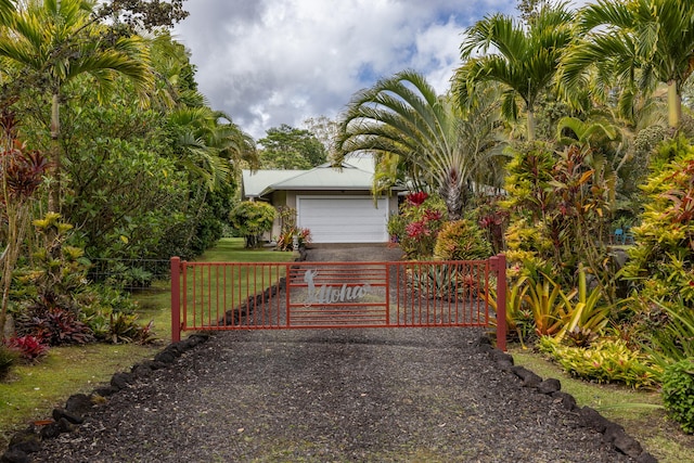 view of gate featuring fence