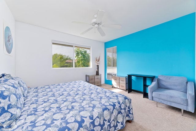 bedroom featuring ceiling fan and carpet floors