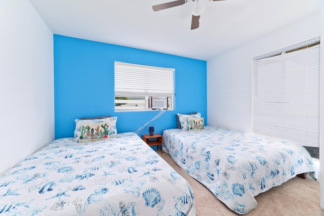 bedroom with carpet floors, cooling unit, and a ceiling fan