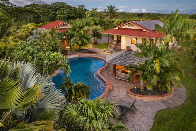 pool with a patio