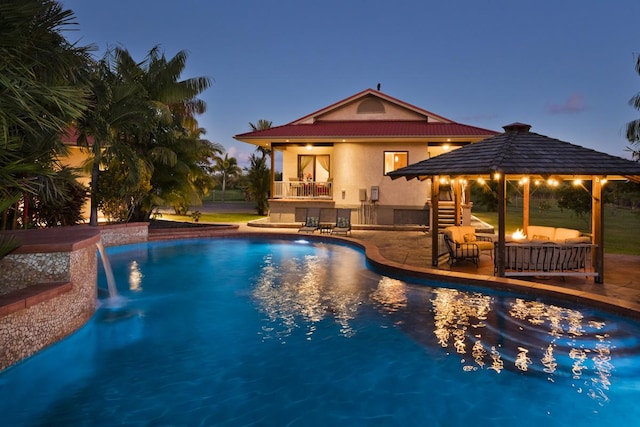 pool featuring a patio area, an outdoor living space, and a gazebo