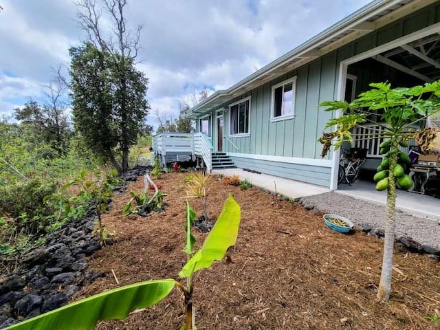 view of side of home with board and batten siding