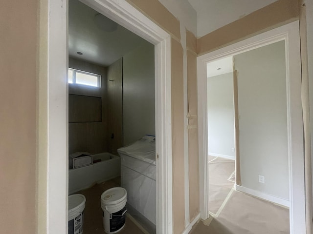 bathroom with baseboards