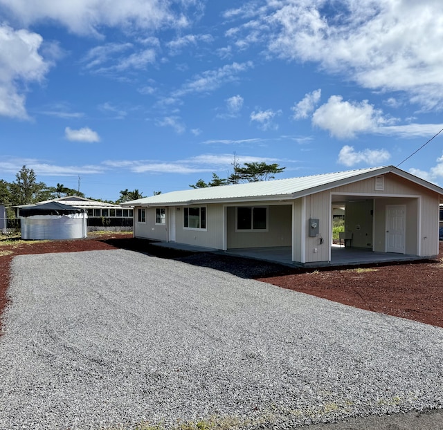 view of front of property featuring metal roof