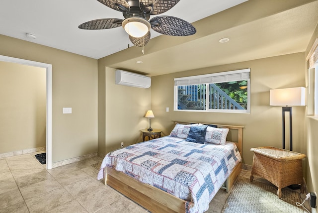 bedroom featuring a wall mounted air conditioner, baseboards, a ceiling fan, and light tile patterned floors