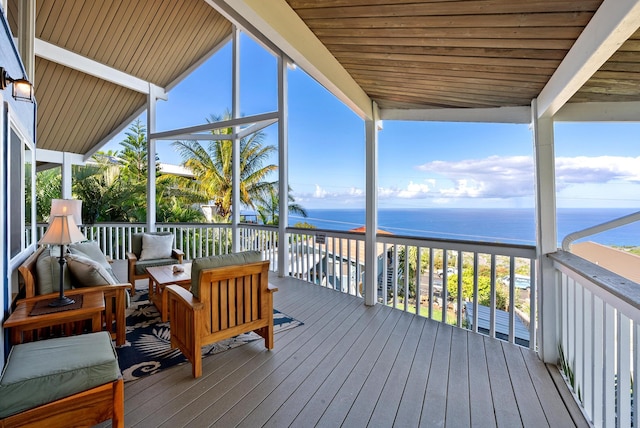 wooden terrace with a water view