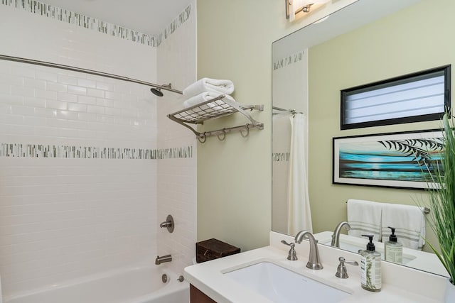 bathroom with shower / bath combo and vanity