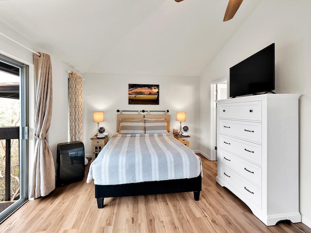 bedroom with a ceiling fan, lofted ceiling, light wood-style floors, and baseboards