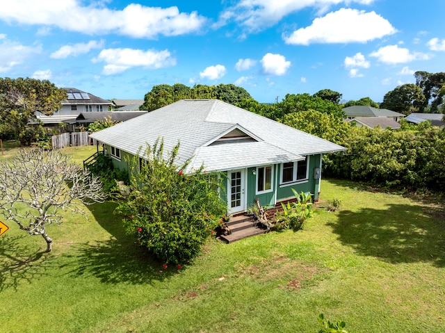 view of front of property with a front lawn