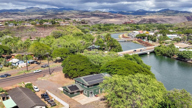 bird's eye view featuring a water and mountain view