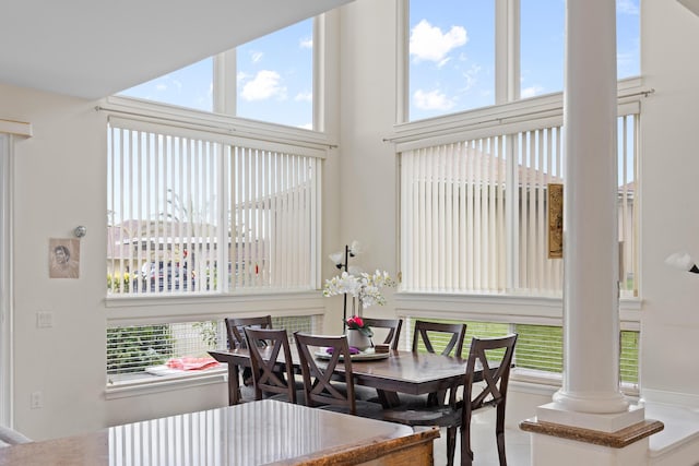 dining space with a high ceiling