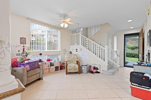 playroom with recessed lighting, ceiling fan, and tile patterned floors