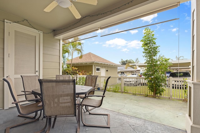 exterior space featuring ceiling fan