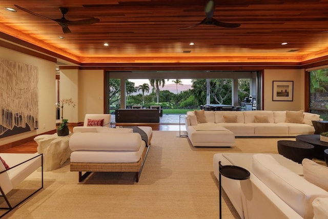 home theater room featuring wood ceiling, a raised ceiling, a ceiling fan, and recessed lighting