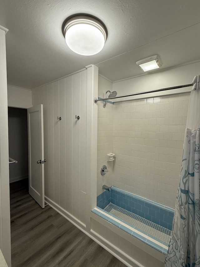 bathroom featuring wood finished floors