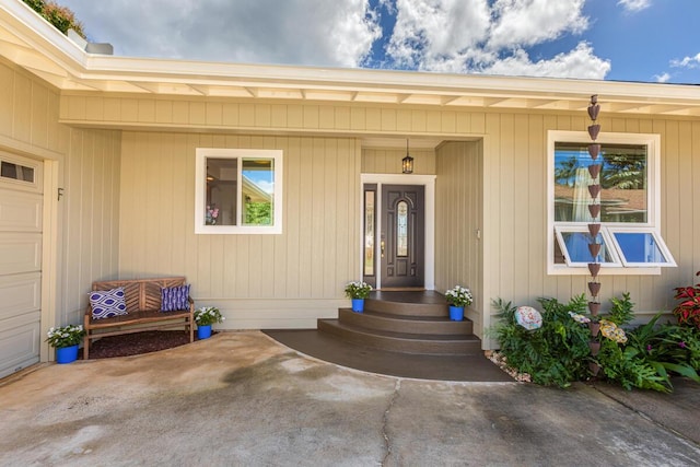 property entrance with an attached garage