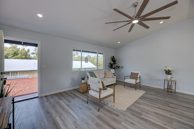 sitting room featuring ceiling fan, recessed lighting, wood finished floors, baseboards, and vaulted ceiling