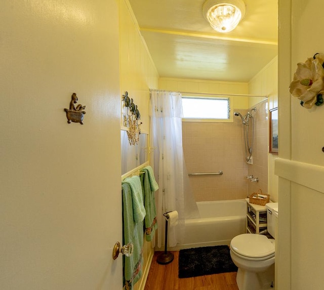 full bathroom with toilet, shower / bathtub combination with curtain, ornamental molding, and wood finished floors