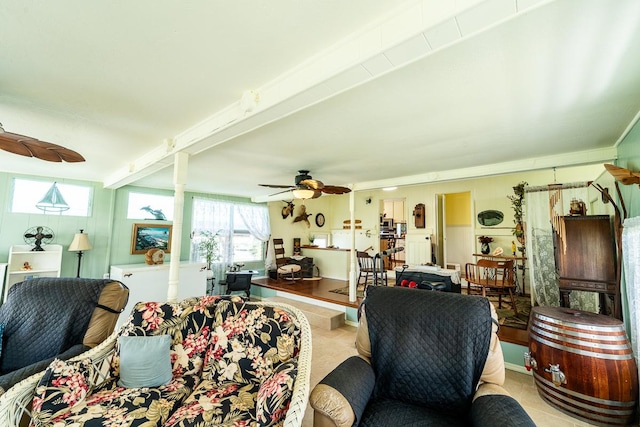 living area featuring a ceiling fan