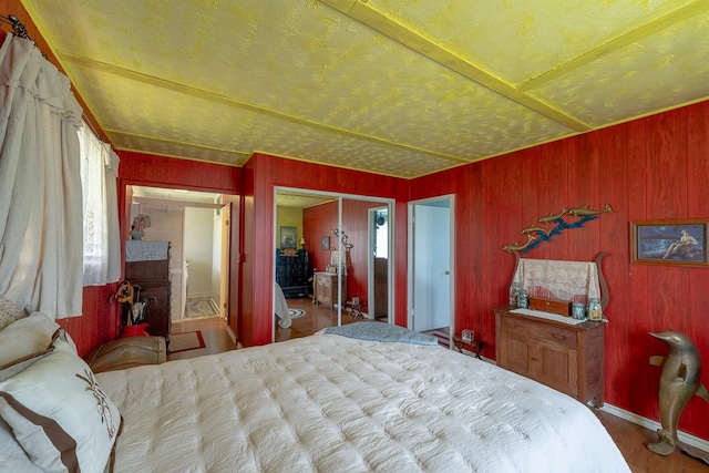 bedroom featuring a closet and baseboards