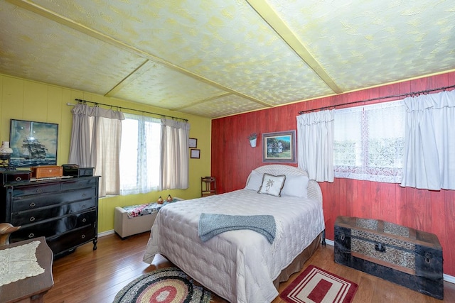 bedroom with wood finished floors