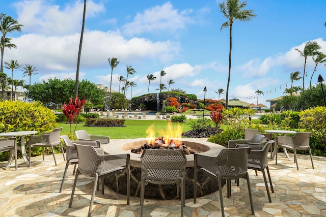 view of patio / terrace with a fire pit