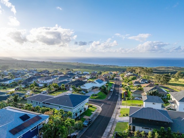 aerial view with a residential view and a water view