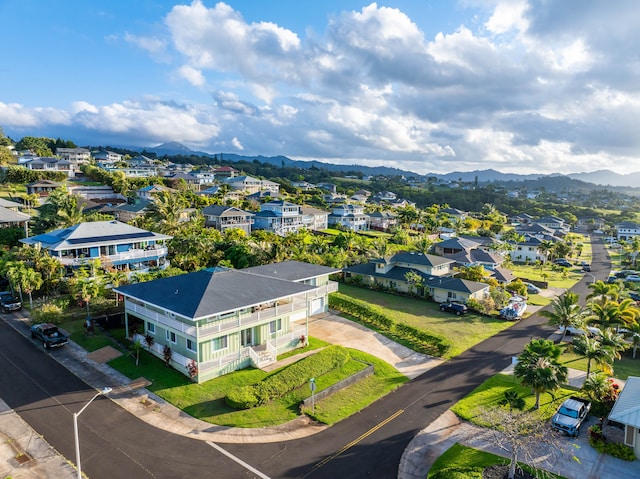 drone / aerial view with a residential view and a mountain view