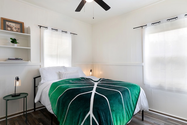 bedroom featuring ceiling fan and wood finished floors