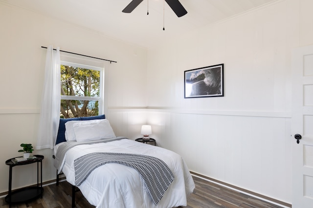 bedroom with ceiling fan and wood finished floors