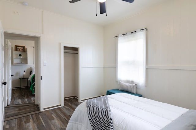 bedroom with a ceiling fan, a closet, and wood finished floors