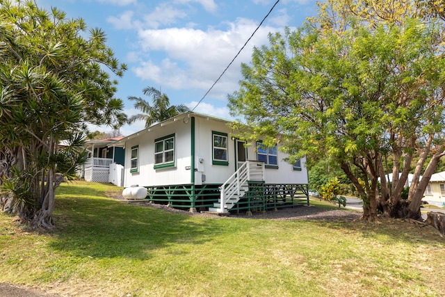 view of front of property with a front lawn