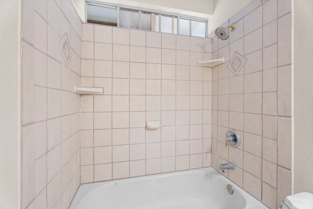 full bath featuring shower / bathing tub combination and toilet