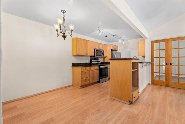 kitchen with appliances with stainless steel finishes, french doors, light wood-type flooring, open shelves, and dark countertops