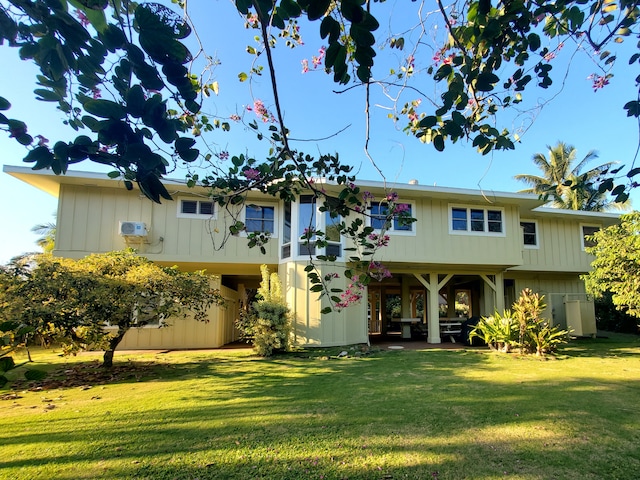 view of front of home with a yard