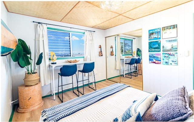 bedroom featuring wood finished floors