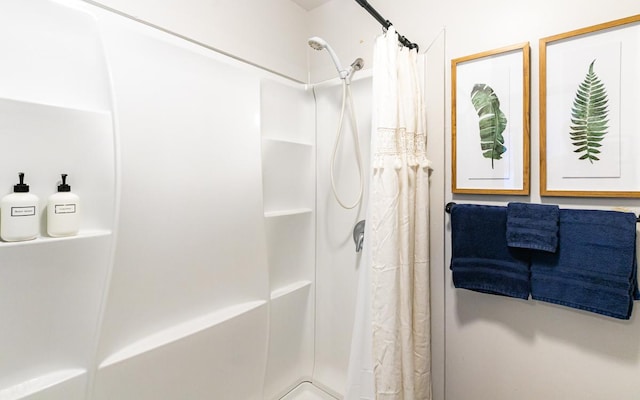 bathroom with a shower with shower curtain