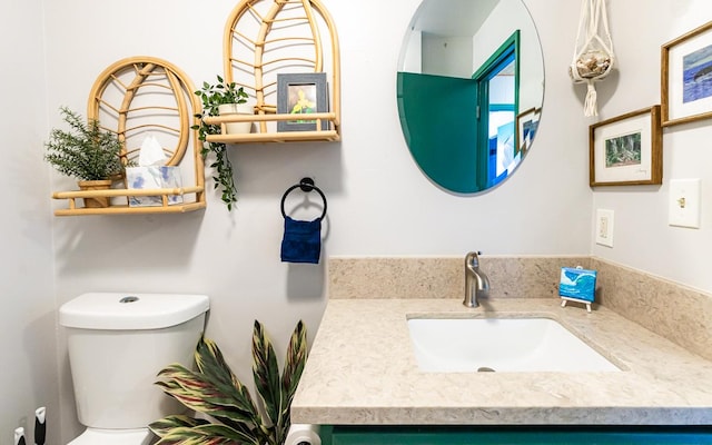 half bath with toilet and vanity