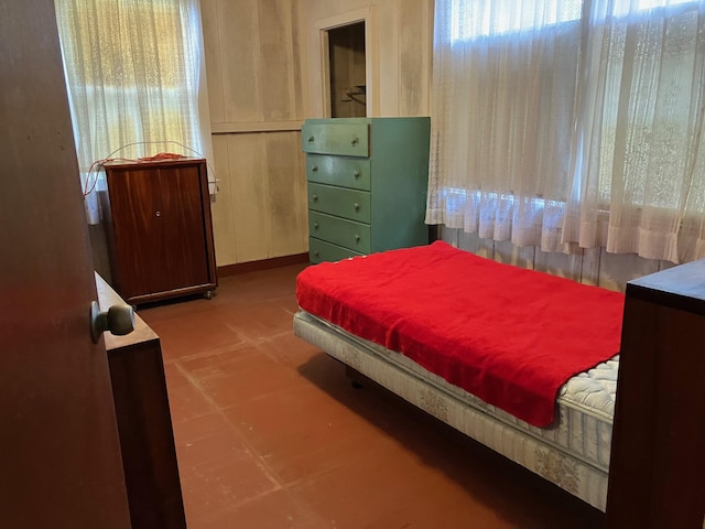 bedroom with tile patterned floors