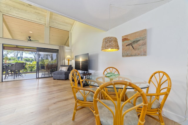 dining area with wood ceiling, high vaulted ceiling, wood finished floors, and a ceiling fan