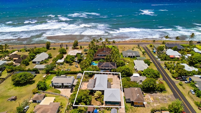 aerial view of residential area featuring property boundaries highlighted and expansive coastline