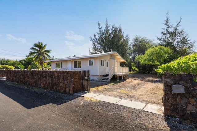 view of front of property with a deck