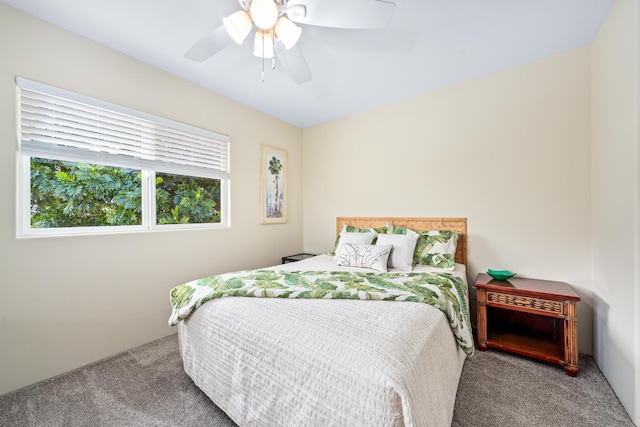 bedroom with carpet flooring and a ceiling fan