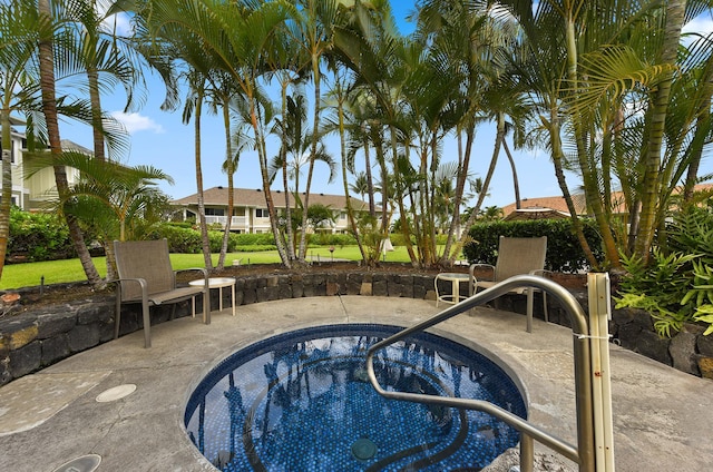 view of pool with a patio area and a community hot tub