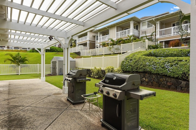 view of patio / terrace featuring a grill, a storage unit, an outdoor structure, and a pergola