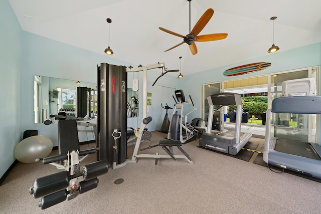 exercise room featuring a ceiling fan and high vaulted ceiling