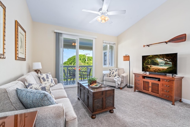 living area with baseboards, a ceiling fan, and carpet floors