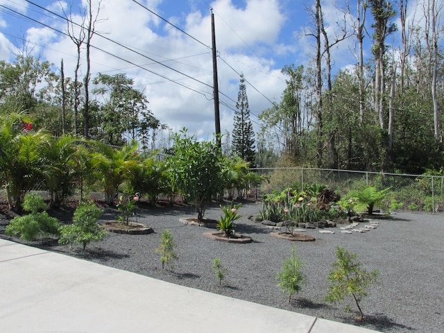 view of yard with fence