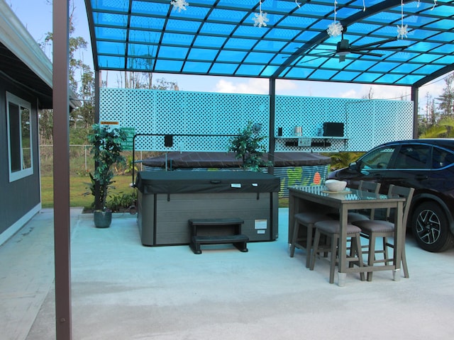 view of patio / terrace featuring a hot tub