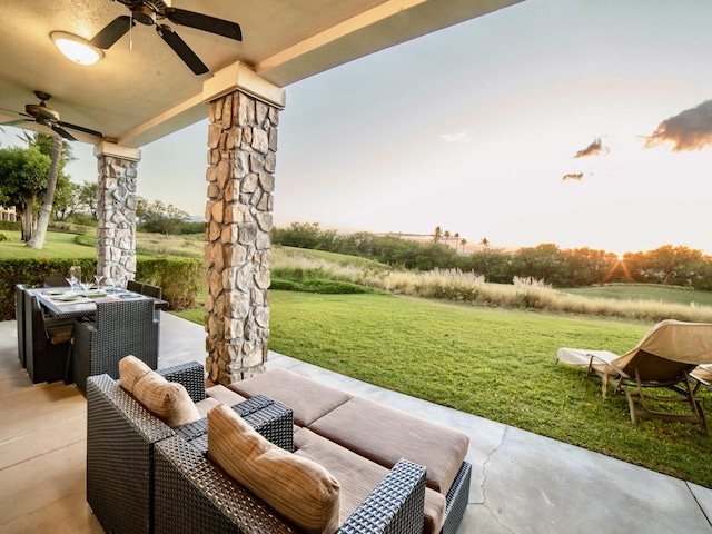 view of patio / terrace featuring ceiling fan